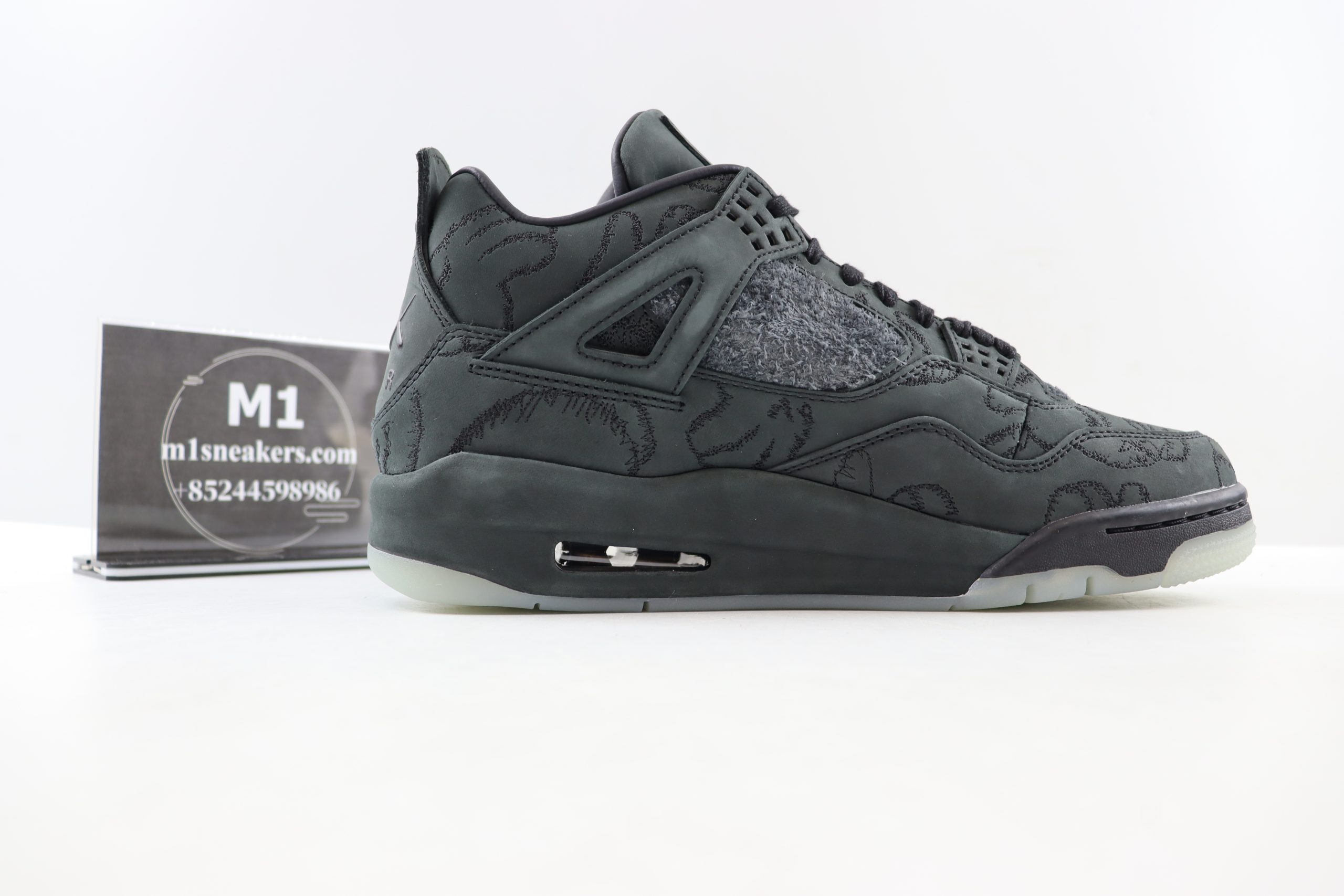Jordan 4 Retro Kaws Black